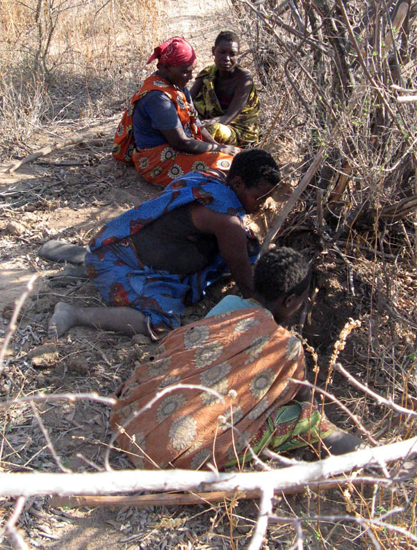 women digging